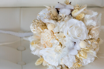 Cream bouquet of the bride. Copy space