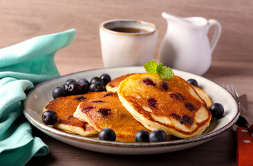 Blueberry pancakes, served