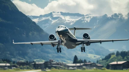 Fotobehang Three-engine business jet making a landing at an alpine airport. © Chingiz