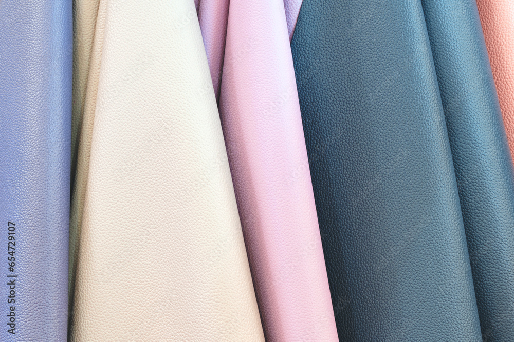 Aufkleber mix colorful hanging vertical stripe leather on the rack. texture of multicolored leather close up.