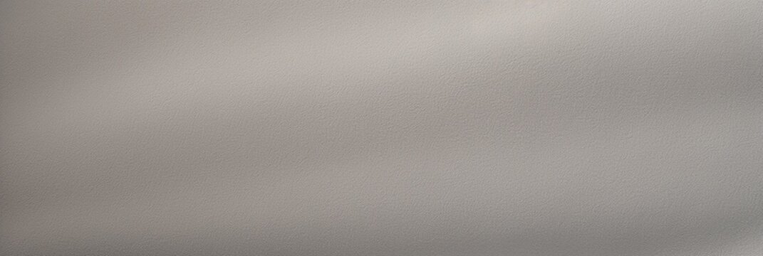 Grey Suede background texture, flat and smooth, enhances the luxury of your space, creating a tactile canvas for a sophisticated web banner that elevates visual appeal with its refined surface