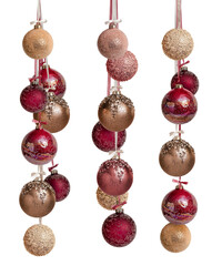 A bunch of New Year's Christmas balls in brown burgundy gold color on a white background. Balloons hang on a ribbon with a bow.