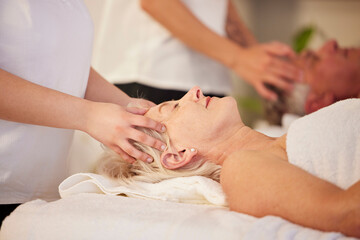 Relax, head massage and senior couple at a spa for health, wellness and anti aging skincare...
