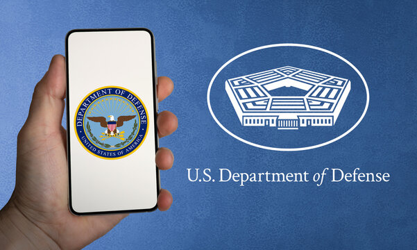 United States Department of Defense emblem displayed on smartphone