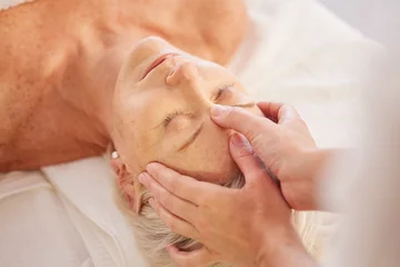 Rollo Massagesalon Relax, head massage and senior woman at a spa for luxury, self care and muscle healing treatment. Health, wellness and elderly female person on a retirement retreat for body therapy at natural salon.