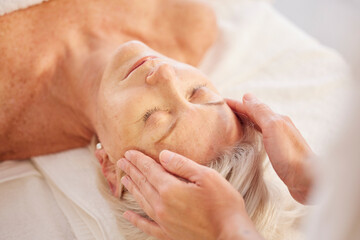 Spa, head massage and senior woman at a spa for luxury, self care and facial healing treatment....