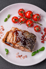 Delicious grilled salmon fillet with salt, spices, herbs and sauce