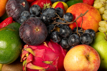 Group of fresh fruits organics for healthy. Colorful fruits. Grape, Fig, Strawberry, apple, pear, kiwi, peach