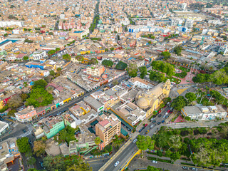 Fototapeta premium Aerial view of the Barranco neighborhood in Lima, Peru in 2023. Spanish colonial style historic buildings. Neighborhood with new houses and also many houses degraded by time. Gastronomic region 