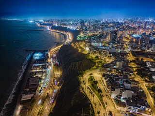 Night aerial image of the Barranco region, Lima. Peru. Homes, businesses and nightlife in 2023.
