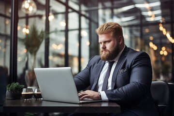 plus size manager using laptop computer on the go