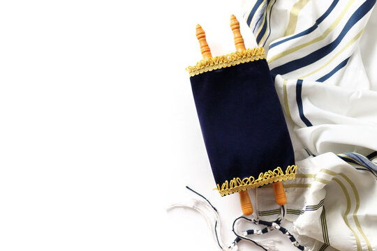 Torah scroll with Tallit on a light background