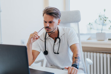 Experienced Doctor Analyzing Diagnostic Test Results in Hospital Clinic