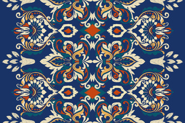 Ikat floral paisley embroidery on blue background.Ikat ethnic oriental pattern traditional.Aztec style abstract vector illustration.design for texture,fabric,clothing,wrapping,decoration,scarf,carpet. - obrazy, fototapety, plakaty