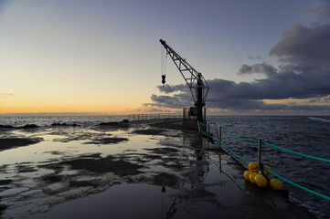 
Pier and crane in the Fishing Village of El Pris, at sunset (Tacoronte, Tenerife)