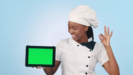 Chef, pointing and woman with tablet, green screen or mockup with food blog, social media or online recipe. Cooking, mobile app and portrait with menu promotion and hand gesture on blue background