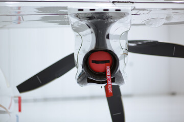 Remove before flight tag and cover for the exhaust port of a turbofan engine.