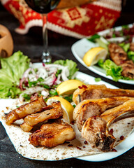 roasted meat on lavash with herbs
