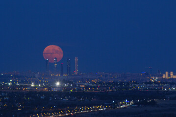 Madrid business area 4 torres skyline night full moon . Spain - obrazy, fototapety, plakaty