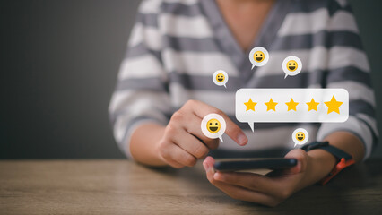 User give rating to service experience on online application, Customer review satisfaction feedback survey concept, Customer can evaluate quality of service leading to reputation ranking of business.