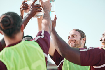 Soccer team, water bottle and exercise cheers with teamwork, achievement and community on grass...