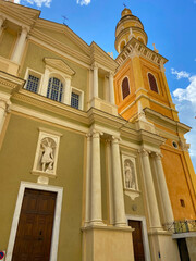 The Basilica of Saint-Michael the Archangel in Menton, France. The tall bell tower on the right side of the church was added at the beginning of the 18th century.