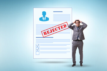 Man receiving rejection notice on his cv