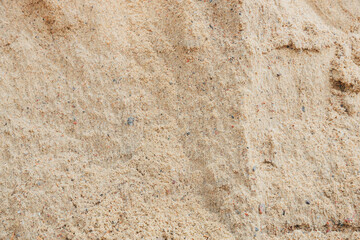 Brown sand texture. Sand background for design with copy space for text or image. Sand texture.