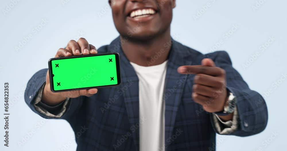 Poster happy man, phone and pointing to green screen in marketing or advertising against a studio backgroun