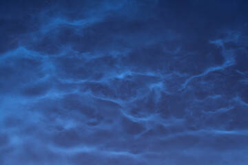 Noctilucent clouds or night shining clouds close up view