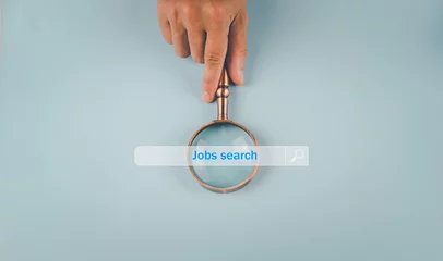 Fotobehang Search Engine Optimization magnifying glass tool information search work on or apply for a job online on the high-speed internet Businessman laptop to search data in global network replication space © Apichat