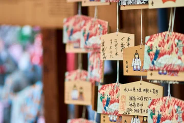 Gordijnen Ema, small wooden plaques (prayer cards) at the Shinto shrine in Kyoto, Japan © Mirko