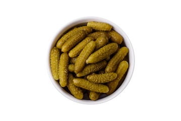 Delicious small pickled cucumbers gherkins with onions, mustard, salt and spices