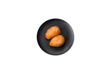 Delicious juicy cutlets or meatballs from minced chicken with salt and spices