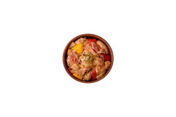 A delicious dish consisting of slices of chicken, sweet peppers and onions