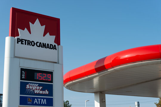 Petro-Canada signage (retail and wholesale marketing brand of Suncor Energy) in Toronto, Canada (with Super Wash carwash facility and RBC ATM unit signs)