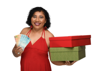 A smiling woman holds Brazilian money and a box of groceries, wearing red clothes against 