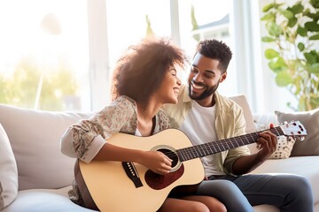 young african american couple playing guitar at home white modern home - obrazy, fototapety, plakaty