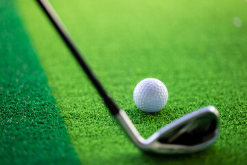 Golf ball on the green grass