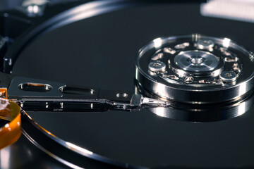 Detailed view of the inside of a hard disk drive. Front view of HDD - obrazy, fototapety, plakaty