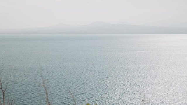 Sevan lake in October on a hazy day