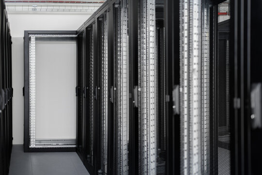 Server racks under construction in a data center hall.