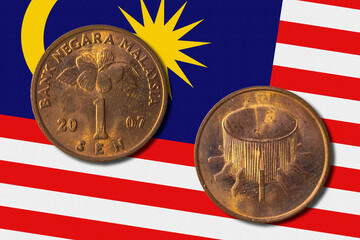 Malaysian ringgit coin, one sen on a national flag © Iva