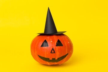 Halloween composition with jack o lanter decor on color background