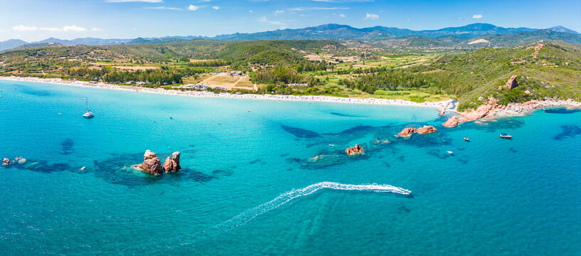 Aerial drone view of the Cea beach with the Red Rocks, Sardinia, Italy