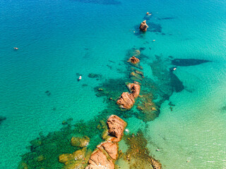 Aerial drone view of the Cea beach with the Red Rocks, Sardinia, Italy