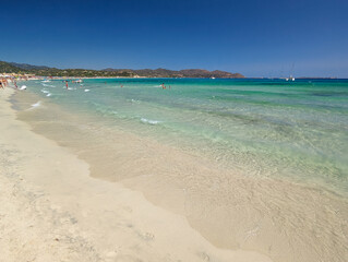 Aerial view of Porto Giunco beach and tower in Villasimius, Sardinia, Italy