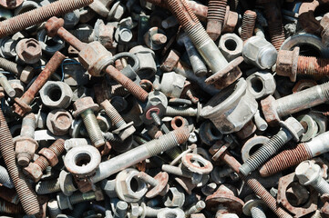 old rusty bolts, nuts and screws close-up
