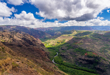 Fototapeta na wymiar Waimea ditch and Mokihana valley in lower areas of Waimea Canyon on Kauai