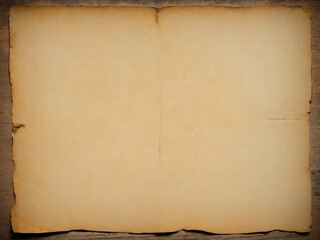 old creased paper page with worn edges and stains on rustic wood background design element with copy space